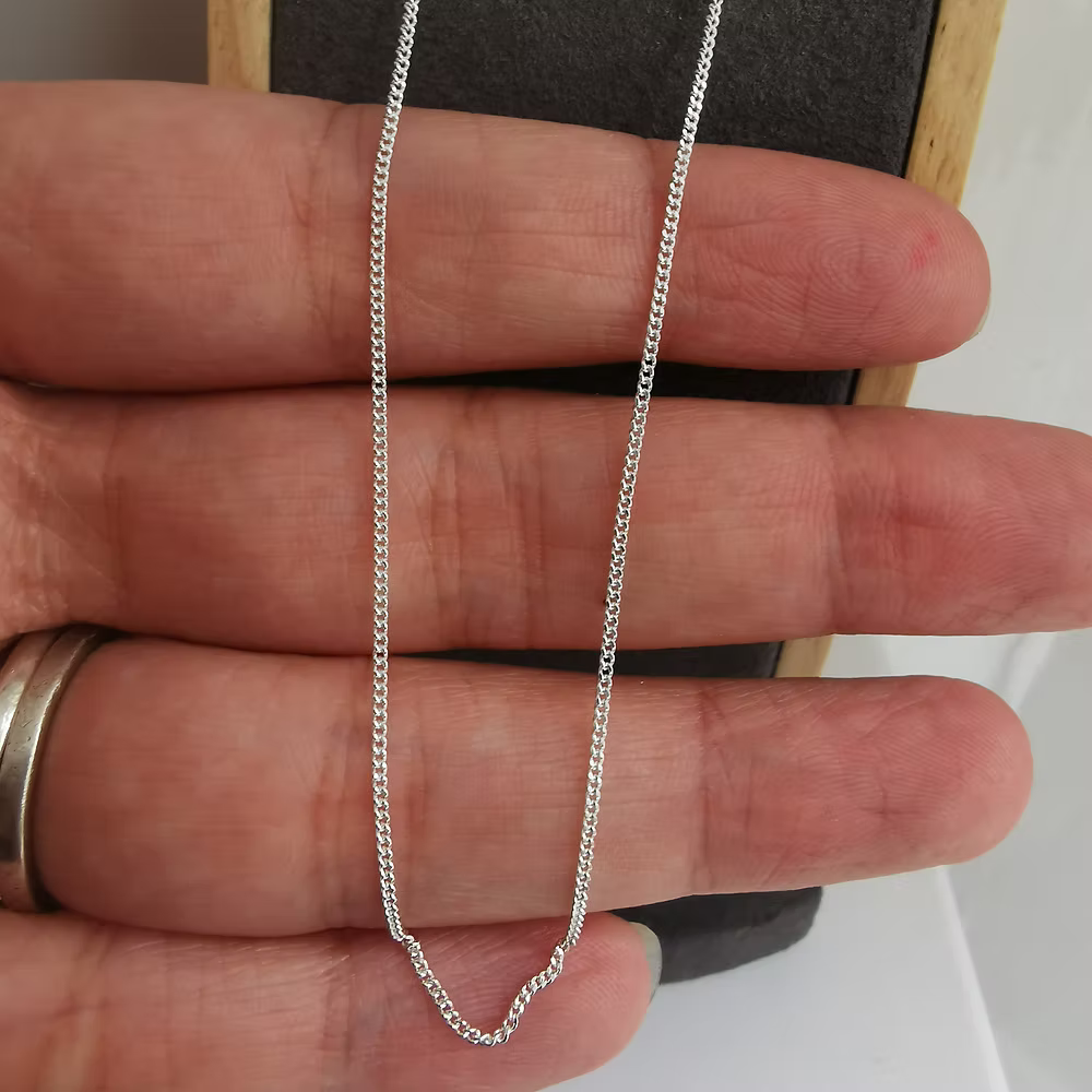 Sterling Silver Pebble Pendant With Heart