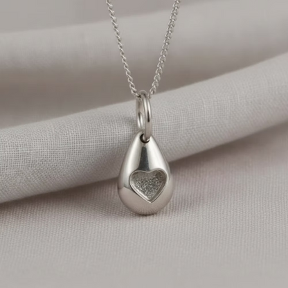 Sterling Silver Pebble Pendant With Heart