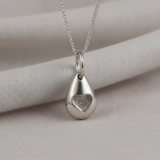 Sterling Silver Pebble Pendant With Heart