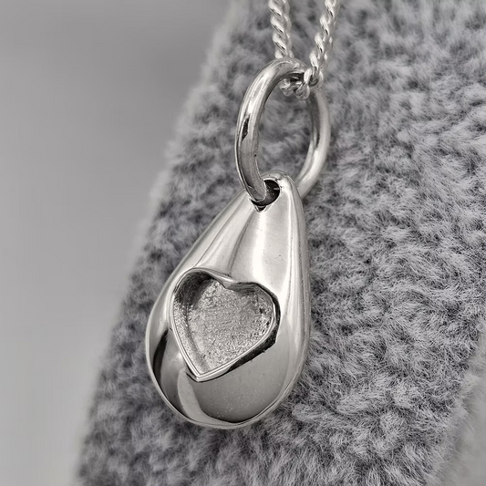 Sterling Silver Pebble Pendant With Heart